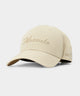 Taupe Macade Golf Range Snapback with a structured brim, tonal Macade embroidery on the front, and subtle