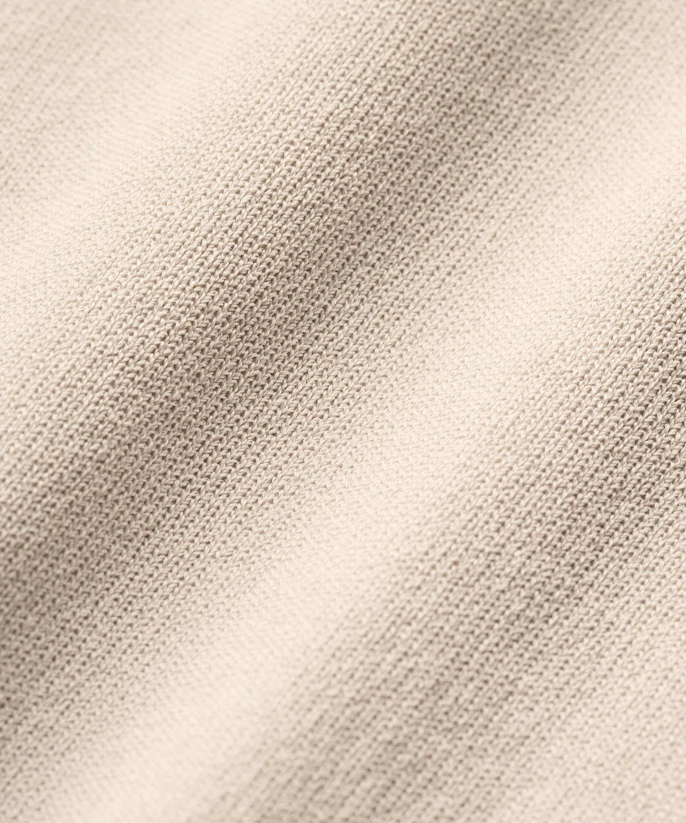 Close-up of the Ella Knit Top in sand, highlighting the fine, smooth knit texture and premium viscose blend fabric for a soft, breathable feel.